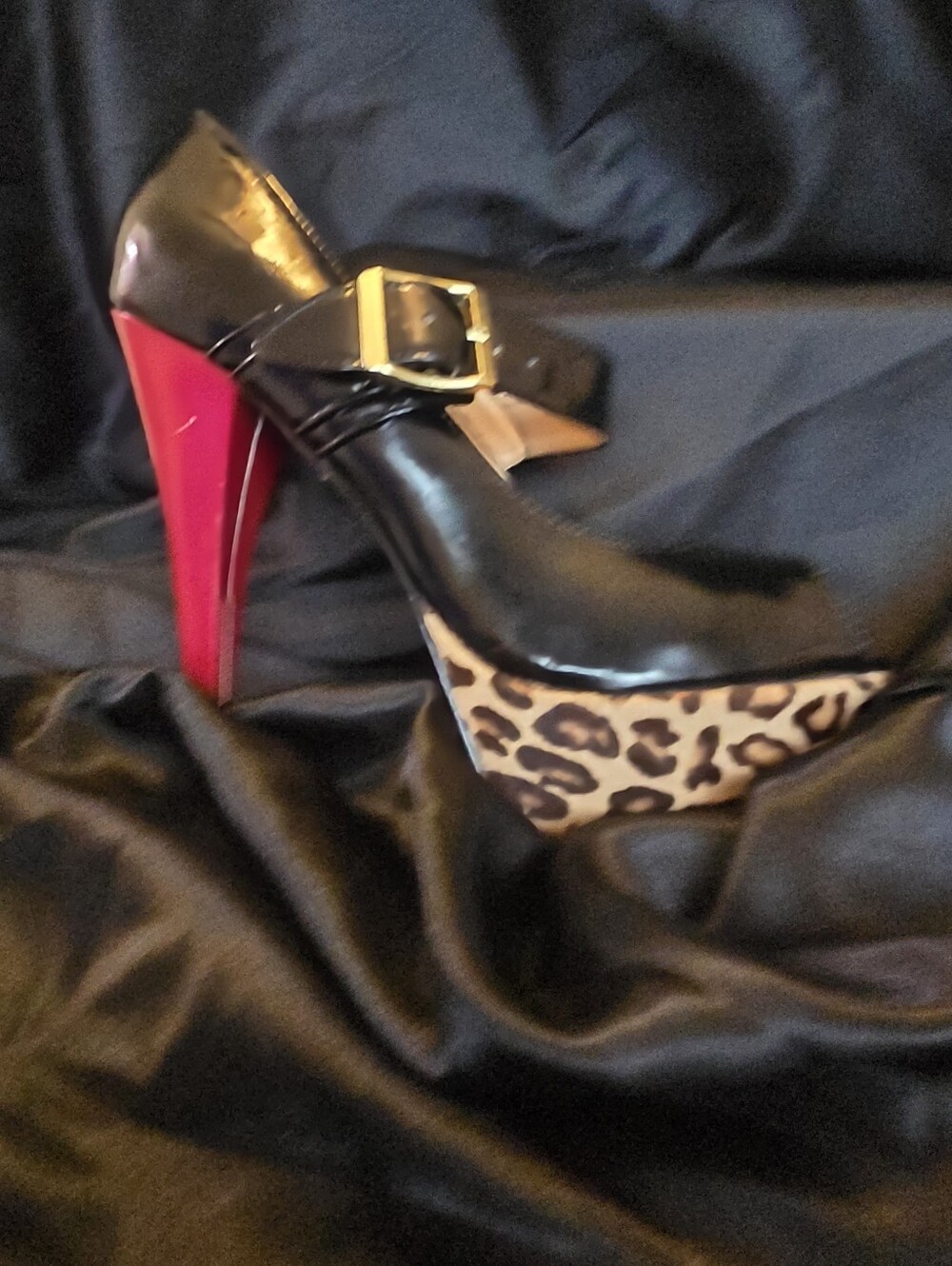 Steve Madden size, 10 leopard print and red stiletto platform heels.